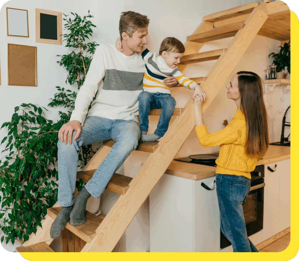 Happy family smiling together, enjoying the convenience of an easy access savings account.