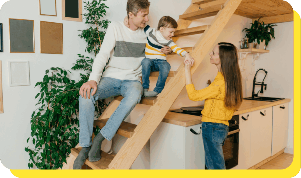 Happy family smiling together, enjoying the convenience of an easy access savings account.