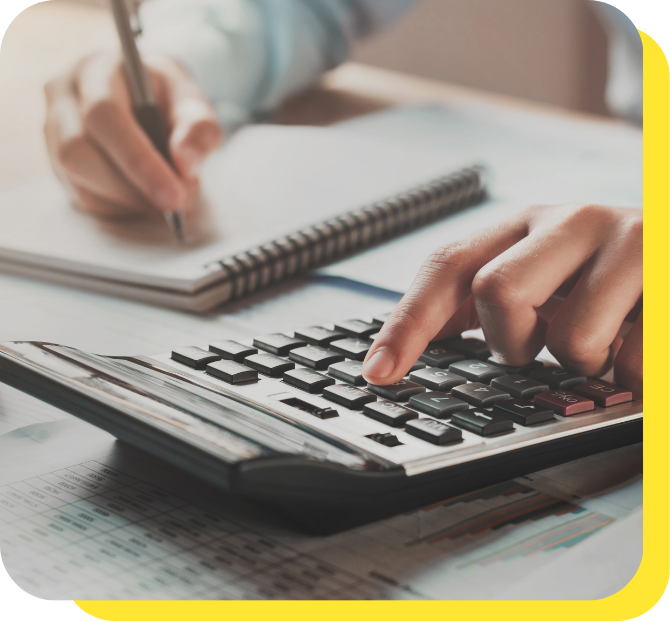 Hand on Calculator Preparing Budget Calculation