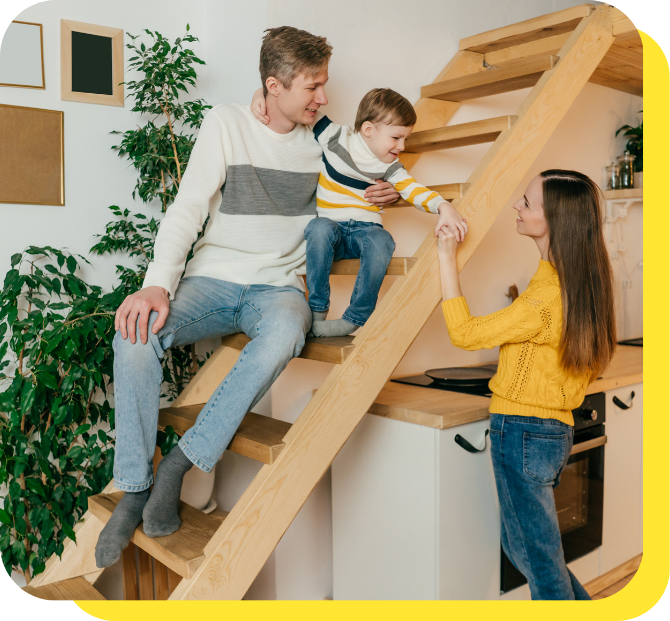 Happy family smiling together, enjoying the convenience of an easy access savings account.