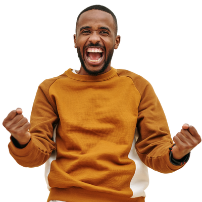 Man smiling and cheering, celebrating the rewards of a prize-linked savings account.