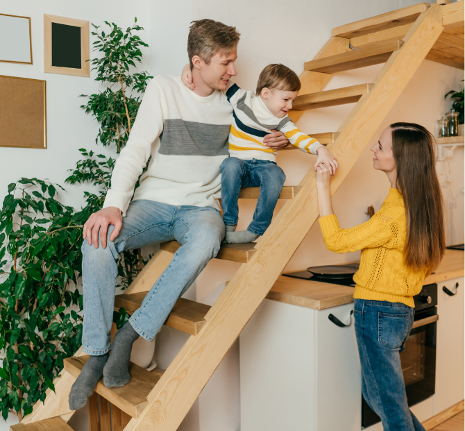 Happy family smiling together, enjoying the convenience of an easy access savings account.