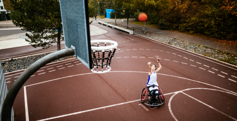 Injured emergency services personnel participating in an adaptive sports event.