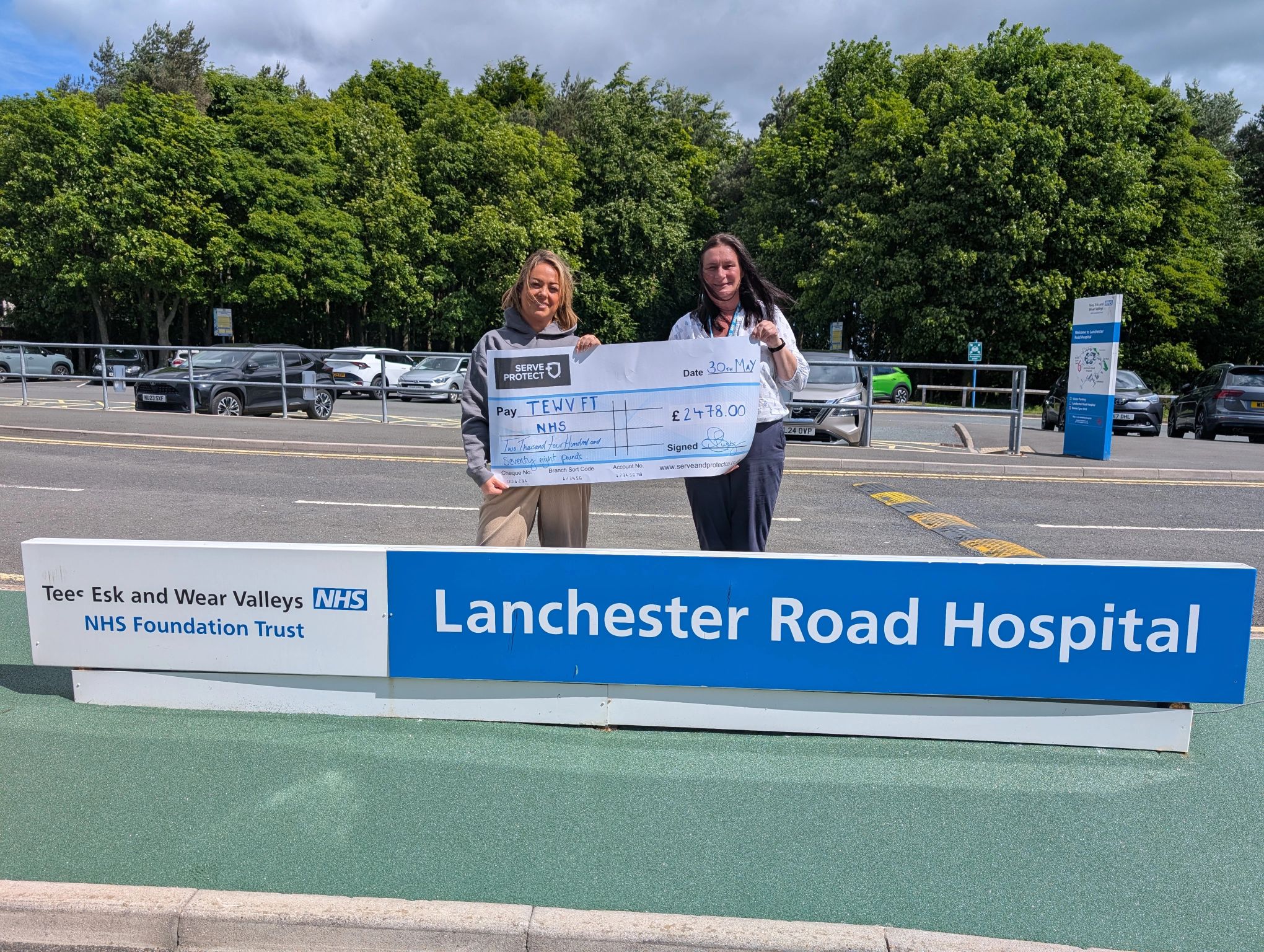 Serve and Protect Credit Union present cheque to TEWV to help develop and maintain TEWV staff wellbeing spaces