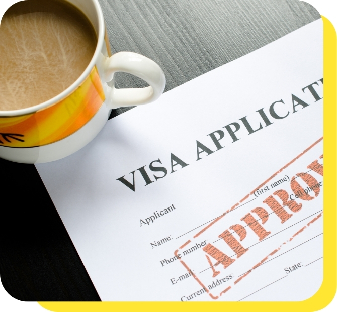 A close-up of a mug placed next to an approved visa application, symbolising the ease and support provided by Serve and Protect's visa loans.
