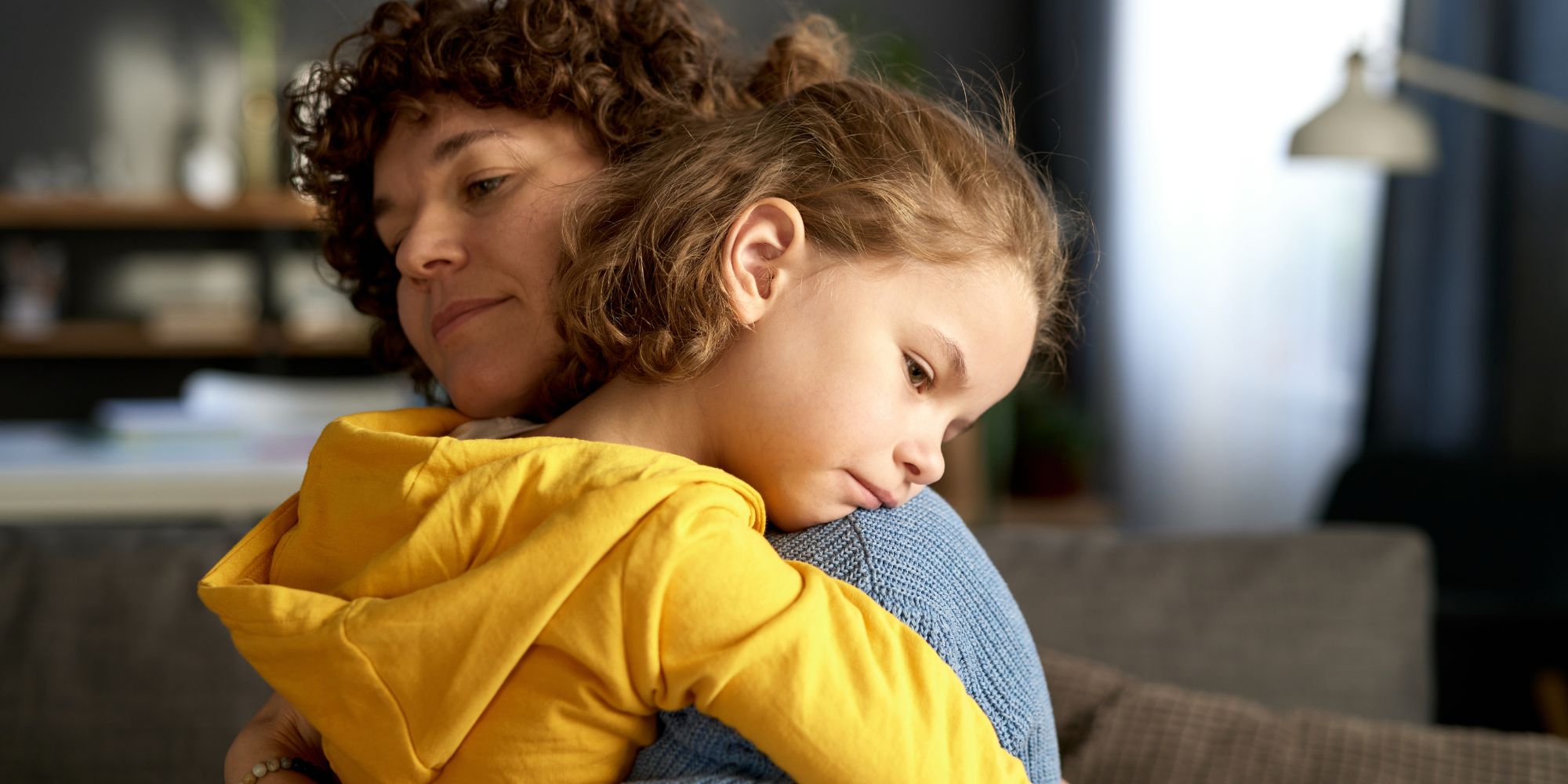 Mother and daughter embracing