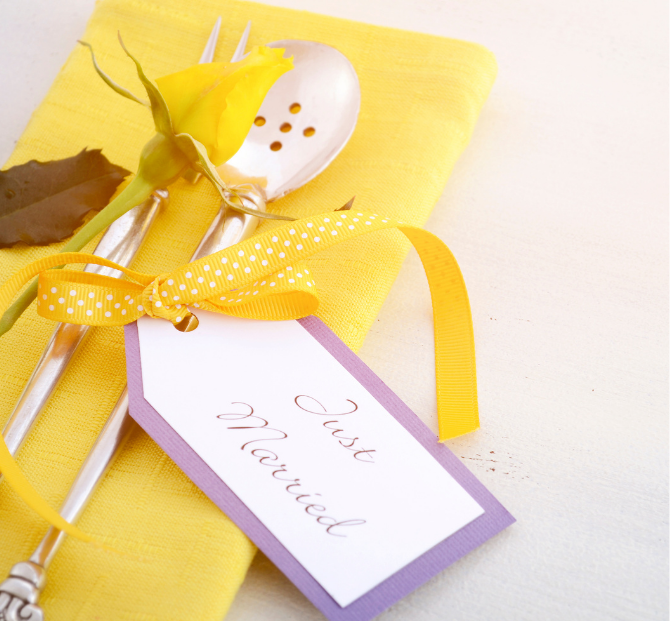A beautifully arranged wedding table setting with fine details, symbolizing a memorable celebration made possible with a Serve and Protect wedding loan.