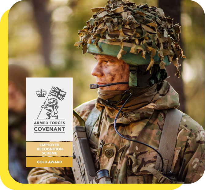 A proud soldier in uniform standing confidently with the Armed Forces Covenant Gold Award logo, representing the company's commitment as an armed forces-friendly employer.